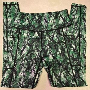 Green snakeskin leggings. Full length.